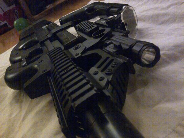 perspective shot :D...the thing in front of my red dot is a scope protector in case you didnt know (really works :S)